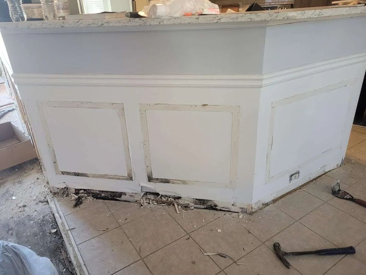 Water damage and mold on kitchen during Storm Damage Restoration in Somersworth